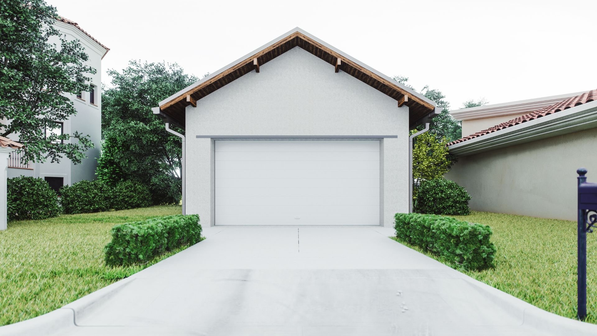 White garage with closed door surrounded by green lawn and bushes